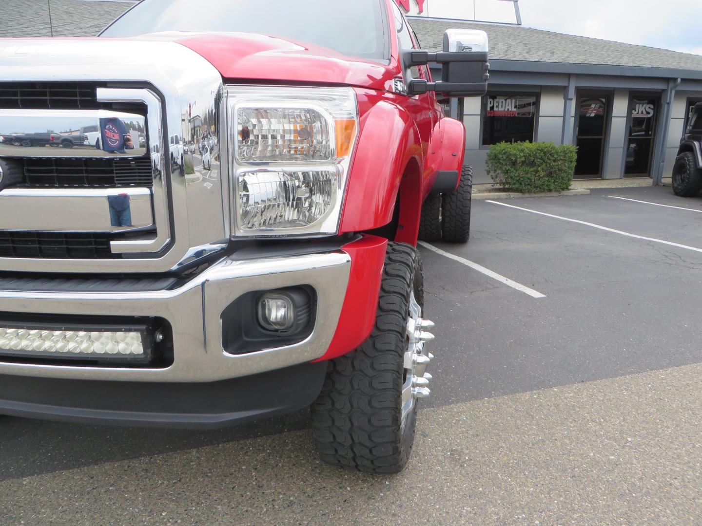 2014 Red /TAN Ford F450 Super Duty Crew Cab Lariat Crew Cab 4WD (1FT8W4DT7EE) with an V8 Turbo Diesel 6.7 Liter engine, Automatic 6-Spd w/SelectShift transmission, located at 2630 Grass Valley Highway, Auburn, CA, 95603, (530) 508-5100, 38.937893, -121.095482 - Wow!! 14 F450 sitting on Icon Vehicle Dynamics suspension, 24" American Force wheels, 37" tires, Rough Country back up leds, Light bar, Window tint, Smoked tail lights 3rd brake light, cab lights, and marker lights, Air bags with compressor, and train horns. Must see this head turner! - Photo#10